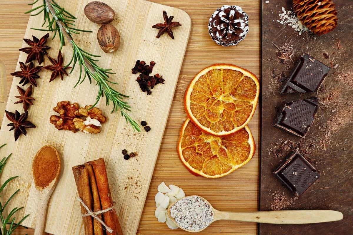 Assorted spices on wooden boards