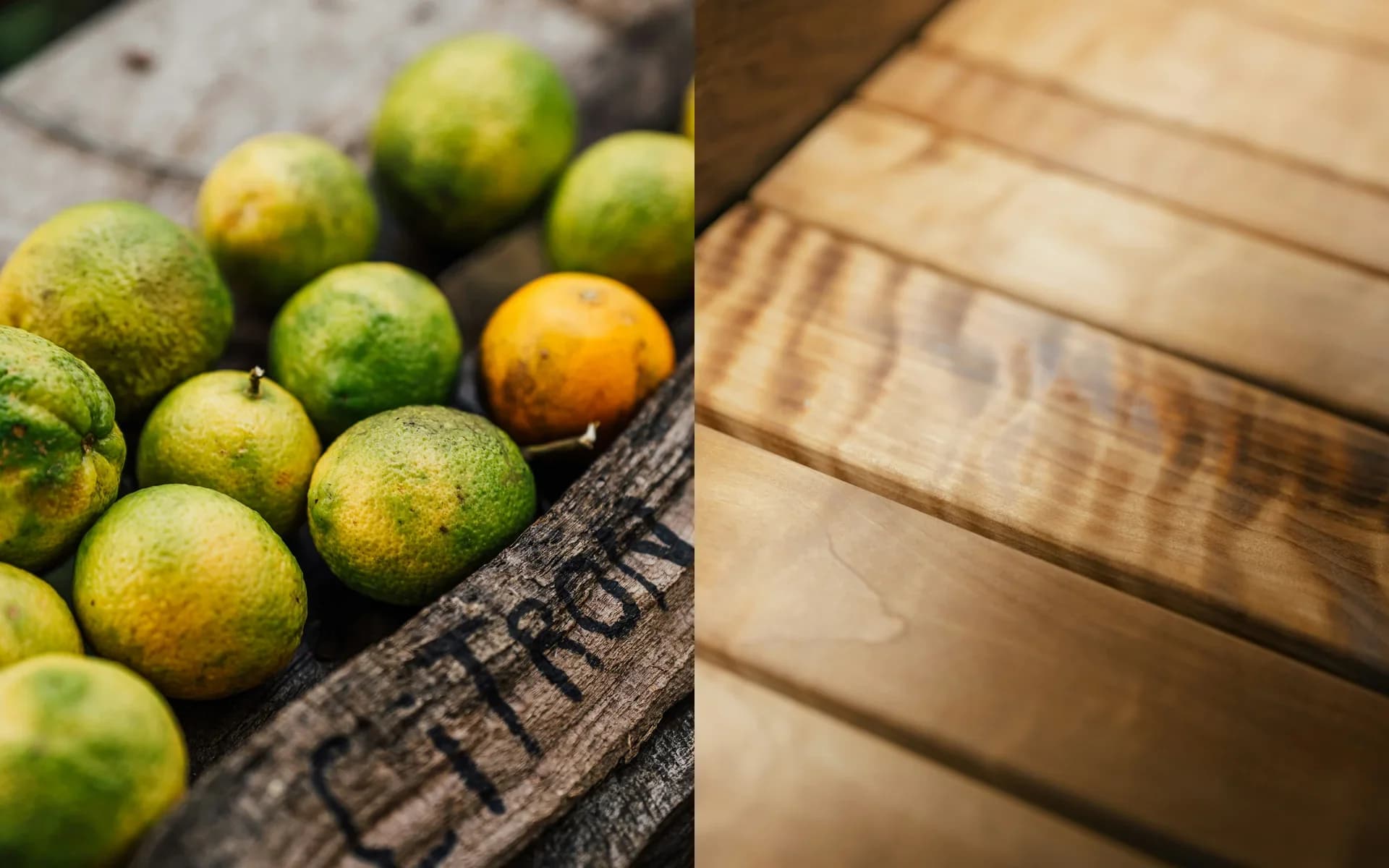 Split still life — green and orange citrus in a wooden crate stenciled CITRON left, honey-toned wood slats right